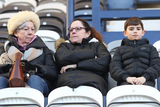 A trio of North End fans get ready to watch the game