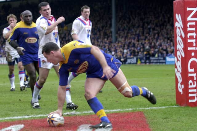 Ben Walker scores for Leeds in a Challenge Cup win over Wakefield in 2002. Picture by Steve Riding.