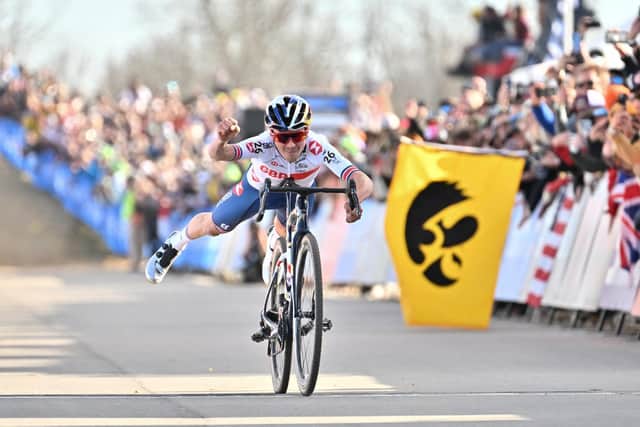 World champion Tom Pidcock crosses the line Superman style at the end of the Walmart UCI Cyclo-cross World Championships - Elite Men. Picture: Will Palmer/SWpix.com.