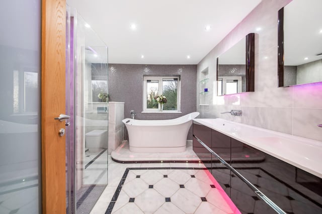 A slipper bath is a feature of this en suite bathroom.