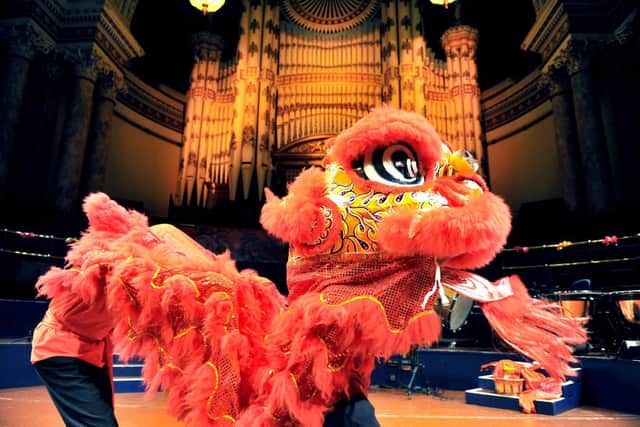 The traditional Lion Dance on stage at Leeds Town Hall part of the Leeds Chinese Community School 'Rhythm of Spring Chinese New Year' celebrations. Photo: Gary Longbottom