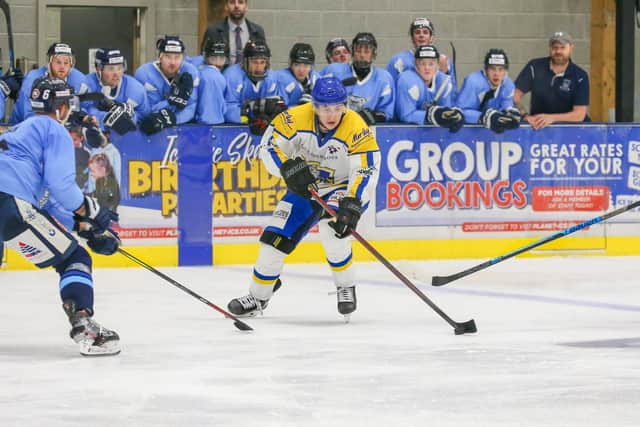 CENTRE OF ATTENTION: Kieran Brown is pursued by Sheffield Steeldogs players 
during a pre-season challenge game. Picture: Andy Bourke/Podium Prints.