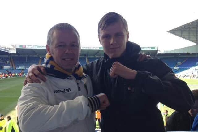 FAMILY TRADITION - Adam Hall and his father are Leeds United supporters