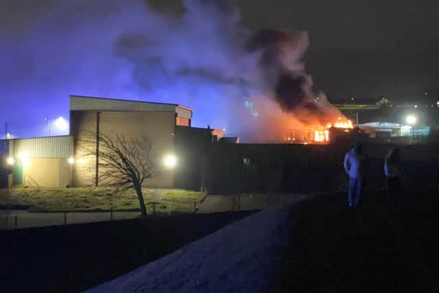 The blaze at Ash Green School's upper site tonight. Photo by Curtis Cato