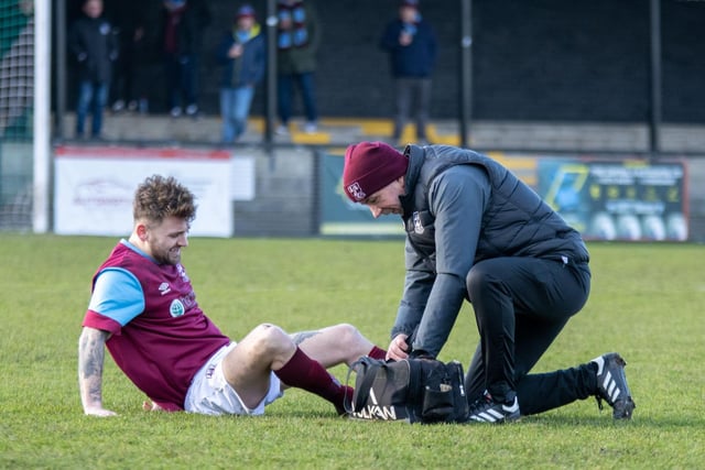 Jimmy Eyles has treatment on the field after picking up an injury. Picture: Mark Parsons