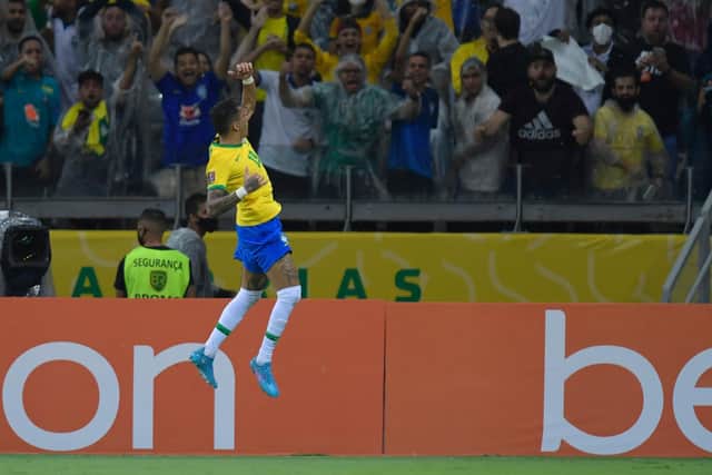 Raphinha celebrates putting Brazil 1-0 up against Paraguay. Pic: Pedro Vilela.