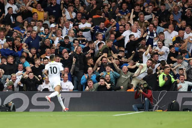 The Elland Road faithful celebrate a goal scored by Leeds United winger Raphinha. Pic: George Wood.