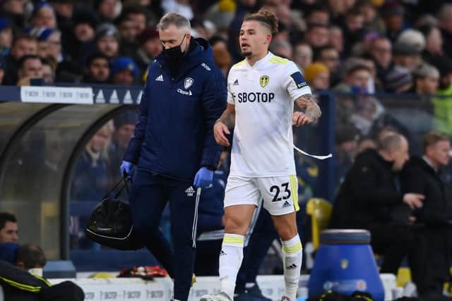 Kalvin Phillips hobbles off after injuring his hamstring during Leeds United's 2-2 draw with Brentford. Pic: Stu Forster.