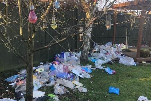 Local residents have shared pictures of the rubbish strewn across gardens, streets and trees