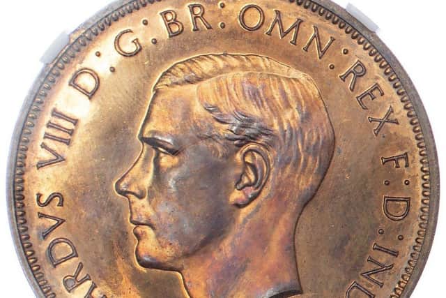A King Edward VIII penny coin. PIC: Showpiece.com/PA Wire