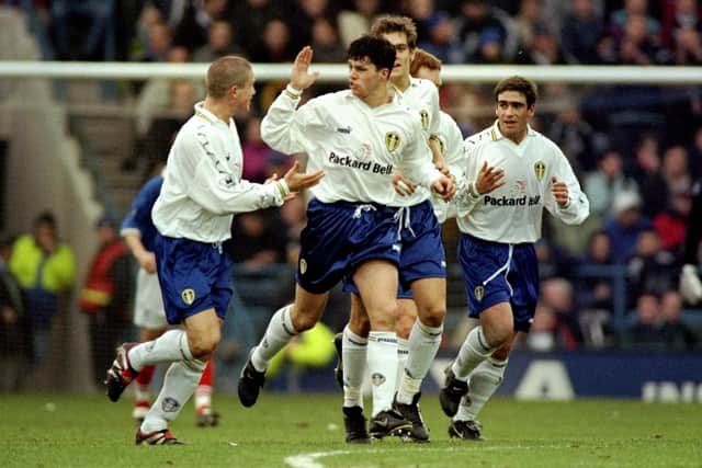 PIECE OF MAGIC: Ian Harte, centre, celebrates with his Leeds United team mates after putting David O'Leary's Whites 2-1 up at FA Cup hosts Portsmouth via a superb free-kick back in January 1999. Picture by Laurence Griffiths /Allsport via Getty Images.