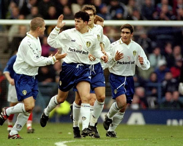 PIECE OF MAGIC: Ian Harte, centre, celebrates with his Leeds United team mates after putting David O'Leary's Whites 2-1 up at FA Cup hosts Portsmouth via a superb free-kick back in January 1999. Picture by Laurence Griffiths /Allsport via Getty Images.