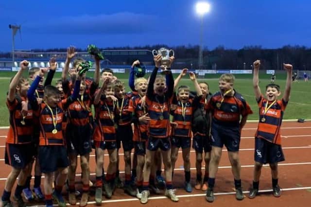 Brigshaw High celebrate winning the Leeds and Hunslet Schools' Year Eight Goldthorpe Cup. Picture by Mark Hudson.
