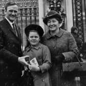 LEEDS ICON - Former Leeds United and England manager Don Revie with his son Don, daughter Kim and wife Elsie at Buckingham Palace after receiving the OBE. Pic: Getty