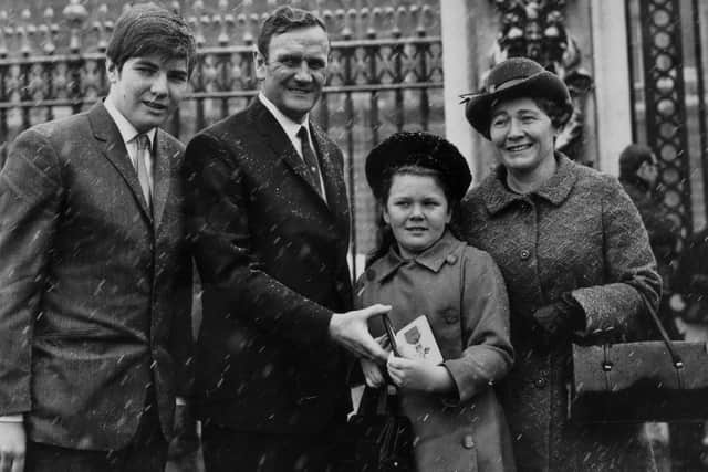 LEEDS ICON - Former Leeds United and England manager Don Revie with his son Don, daughter Kim and wife Elsie at Buckingham Palace after receiving the OBE. Pic: Getty