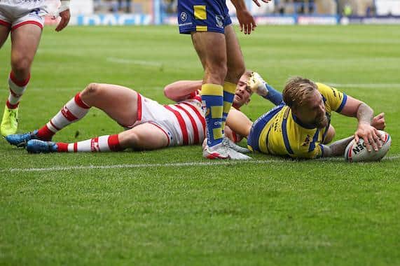 Blake Austin scores for Warirngton against Leigh last season. Picture by Paul Currie/SWpix.com.