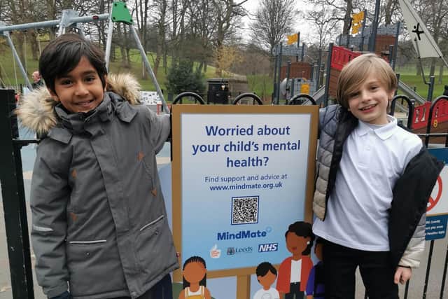 Pupils from Roundhay St John’s Primary School with one of the new signs installed in Roundhay Park as part of Children’s Mental Health Week