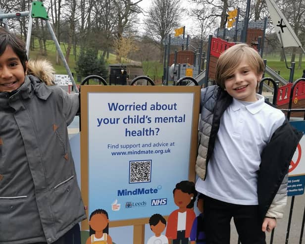 Pupils from Roundhay St John’s Primary School with one of the new signs installed in Roundhay Park as part of Children’s Mental Health Week