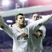 Former Leeds United heroes Mark Viduka and Dom Matteo celebrate together against Lazio. Pic: Yorkshire Post Newspapers
