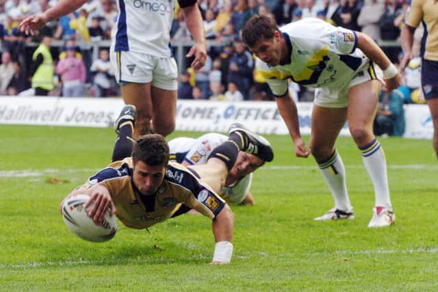 Richard Mathers scores for Rhinos against Warrington in 2005. Picture by Steve Riding.