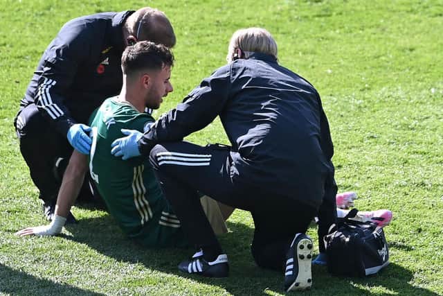 George Baldock receives treatment during Sheffield United's 2-1 defeat to Leeds United. Pic: Laurence Griffiths.