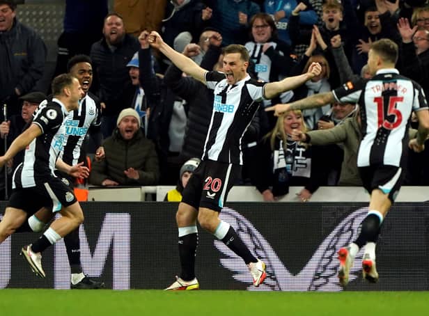 Newcastle United's Ryan Fraser (left) celebrates scoring their side's second goal against Everton (Picture: PA)