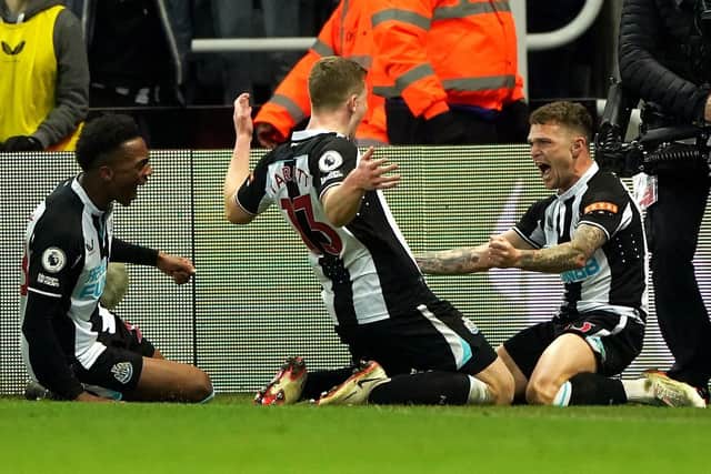 Newcastle United's Kieran Trippier (right) celebrates scoring their side's third goal of the game with team-mates (Picture: PA)