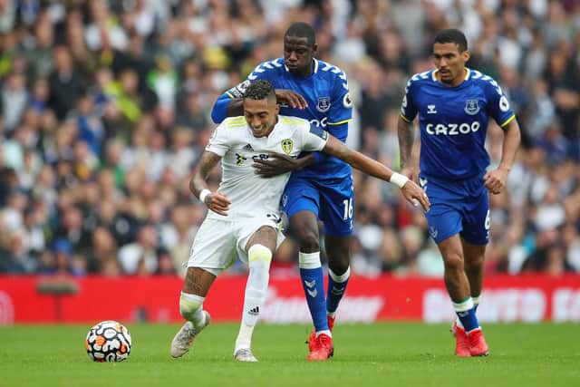 Raphinha holds off Everton's Abdoulaye Doucouré at Elland Road. Pic: Jan Kruger.