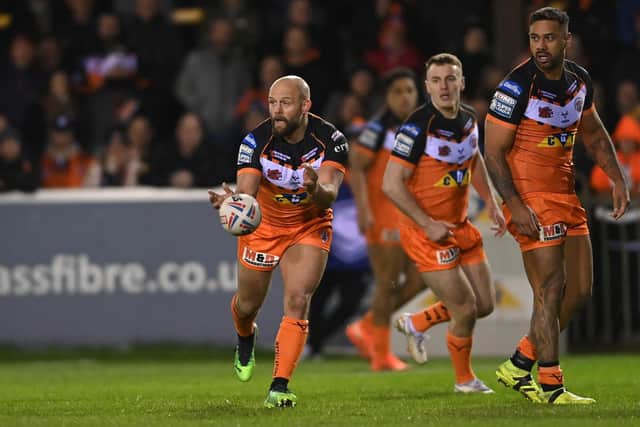 Tigers captain Paul McShane offloads. Picture by Bruce Rollinson.