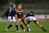 Georgia Roche, centre, in action for Castleford against Rhinos in the 2019 Grand Final. Picture by Richard Sellers/PA Wire.