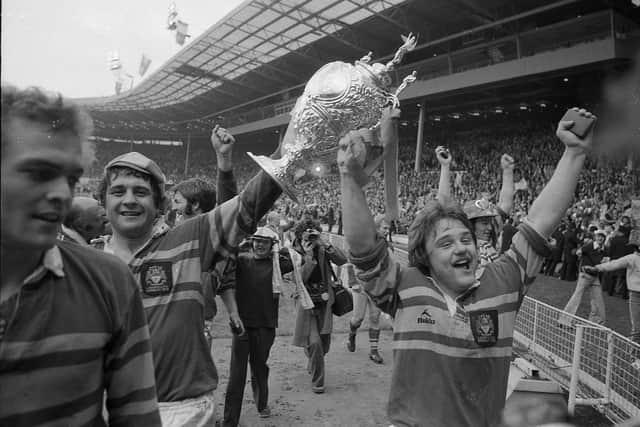 Kevin Dickj, right, celebrates Leeds' 1978 Challenge Cup final win at Wembley. Picture by Steve Riding.