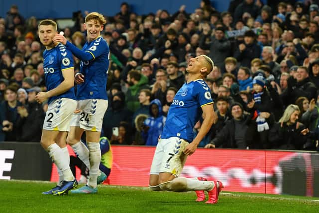 I'LL TAKE IT: Everton's Anthony Gordon, centre, credited with the third Toffees strike against Leeds United for diverting home the shot from Richarlison, right. Photo by Marc Atkins/Getty Images.