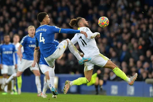 Tyler Roberts and Everton's Mason Mason Holgate challenge for the ball. Picture: Bruce Rollinson.