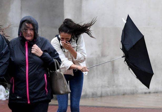 Gusts of 80-90 mph are possible with flood warnings also in place across much of England.