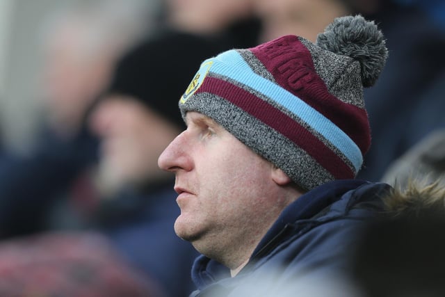 Burnley fans anxiously watch the second half action