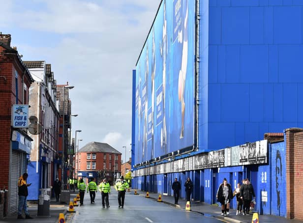 CROWD INCIDENT - A Merseyside Police officer is seen using his pepper spray on Leeds United fans during the game against Everton in footage published on social media. Pic: Getty