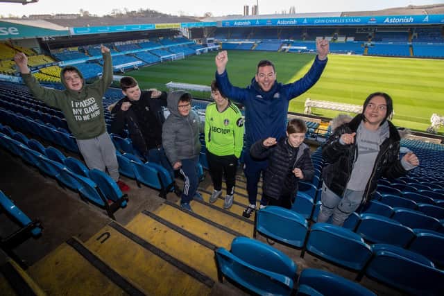 Former Leeds United player turned media pundit, Ben Parker, with students from Southway school who are taking part in a literacy programme being run by The Leeds United Foundation.