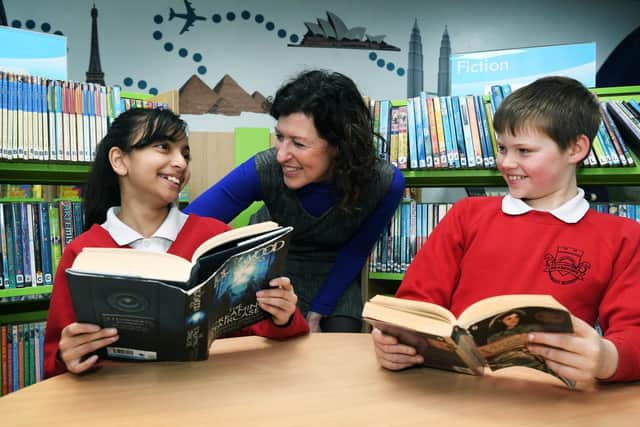 Digital leaders Priya Kaur and Thomas Henry with headteacher at Bramhope Primary School Rachel Colbourn, taking part in online safety awareness.