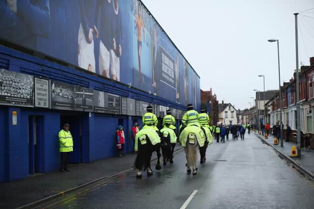 ARREST MADE - Merseyside Police officers used PAVA spray on Leeds United fans as trouble flared in the Goodison Park away end. Pic: Getty