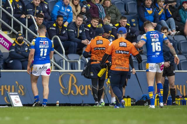 Leeds Rhinos' James Bentley, left, is sent off against Warrington Wolves. Picture: Tony Johnson.