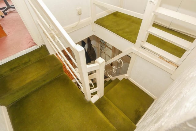 Head up the stairs to the final two bedrooms.