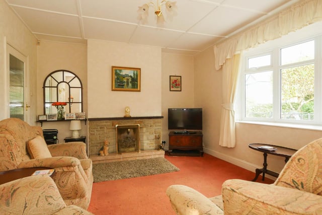 The sitting room is one of three reception rooms in the house. The quaint and cosy space is perfect for sitting back and relaxing with family.