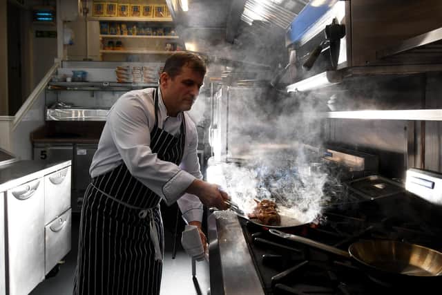 Castro cooking his rack of lamb dish, one of his favourites on the menu (Photo: Simon Hulme)