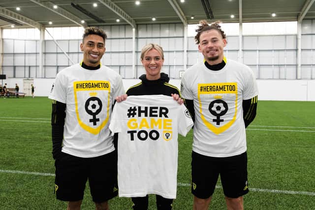 SUPPORT: Whites stars Raphinha, left, and Kalvin Phillips, right, with Leeds United Women ace Olivia Smart. Picture by LUFC.