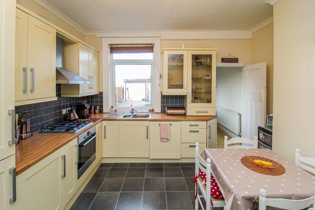 The Wakefield property's kitchen with a range of fitted units and integral appliances.