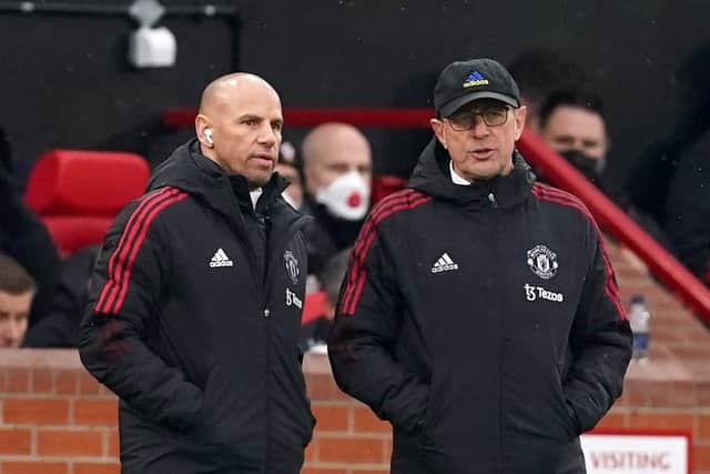 Manchester United manager Ralf Rangnick (right) with assistant coach Chris Armas. Picture: Martin Rickett/PA Wire.