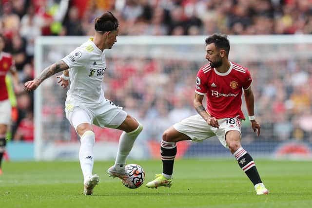 KEY MAN: Manchester United's Bruno Fernandes, right, pictured turning Leeds United's Robin Koch in August's clash between the Red Devils and Whites at Old Trafford. Photo by Alex Morton/Getty Images.