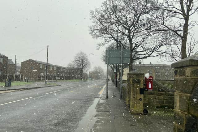 Snow coming down on Town Street in Bramley.