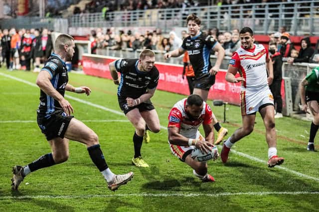 Samisoni Langi runs in to score a try for Catalans Dragons against Wakefield Trinity. Picture by Laurent Selles/Catalans Dragons/SWpix.com