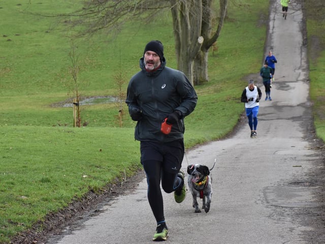 Bridlington Road Runner Alan Feldberg and his dog in actin at Sewerby Parkrun